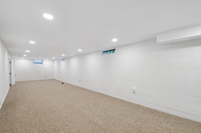 4337 Colorado Ave N, Crystal, MN 55422 - basement featuring light colored carpet, recessed lighting, and concrete block wall