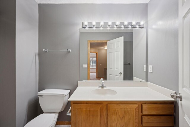 14220 Xenon St NW Unit 6Nw, Ramsey, MN 55303 - bathroom featuring toilet and vanity