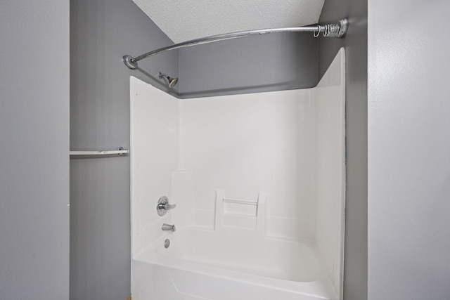 14220 Xenon St NW Unit 6Nw, Ramsey, MN 55303 - full bath with a textured ceiling and bathtub / shower combination