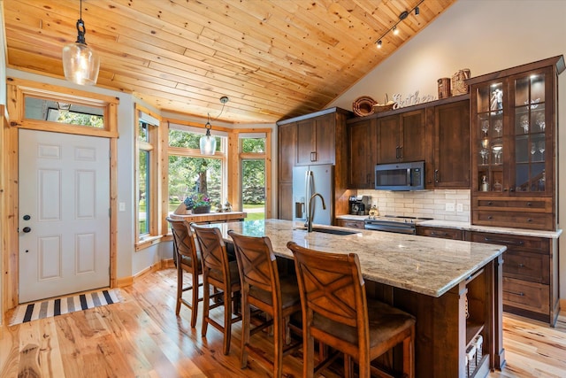 34792 Shore Ln, Crosslake, MN 56442 - kitchen featuring stainless steel appliances, wooden ceiling, tasteful backsplash, dark brown cabinetry, and light wood-style floors