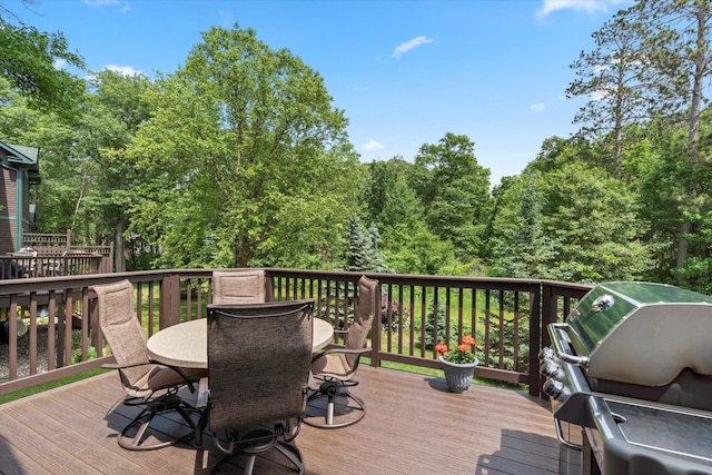34792 Shore Ln, Crosslake, MN 56442 - deck with outdoor dining area and area for grilling