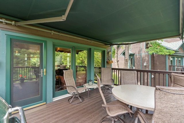 34792 Shore Ln, Crosslake, MN 56442 - wooden deck featuring french doors and outdoor dining area