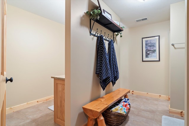 34792 Shore Ln, Crosslake, MN 56442 - mudroom with baseboards and light tile patterned floors