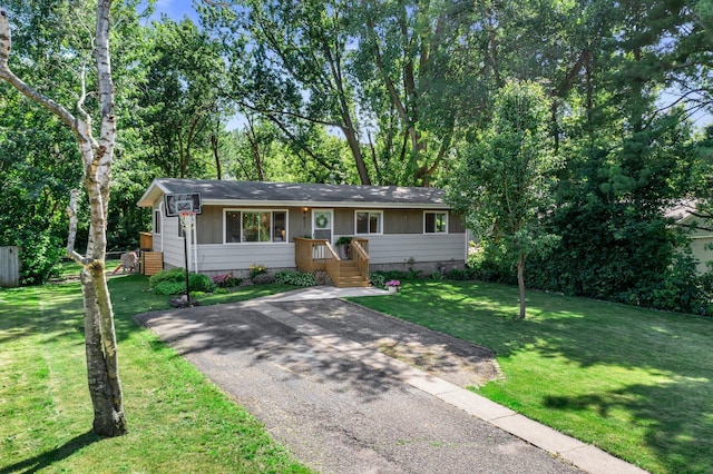 832 10th Ave SE, Forest Lake, MN 55025 - view of front of property with crawl space, a front yard, and asphalt driveway