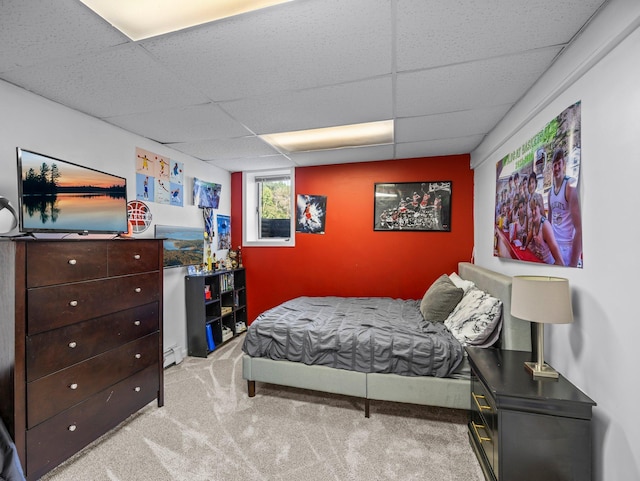 832 10th Ave SE, Forest Lake, MN 55025 - bedroom with a drop ceiling, carpet flooring, and a baseboard radiator