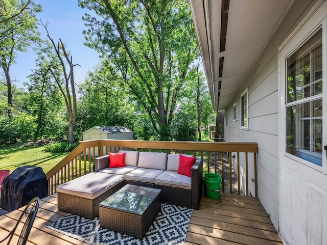 832 10th Ave SE, Forest Lake, MN 55025 - deck with an outdoor hangout area, area for grilling, a storage shed, and view of wooded area