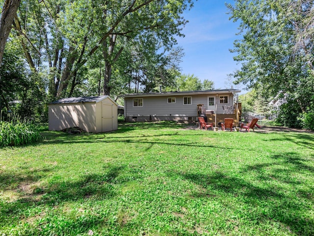 832 10th Ave SE, Forest Lake, MN 55025 - back of house with a shed, a lawn, and crawl space