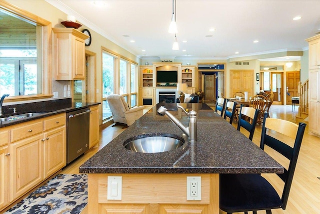 2719 Spring Lake Rd SW, Prior Lake, MN 55372 - kitchen with dishwasher, light brown cabinets, crown molding, a kitchen island with sink, and a kitchen bar