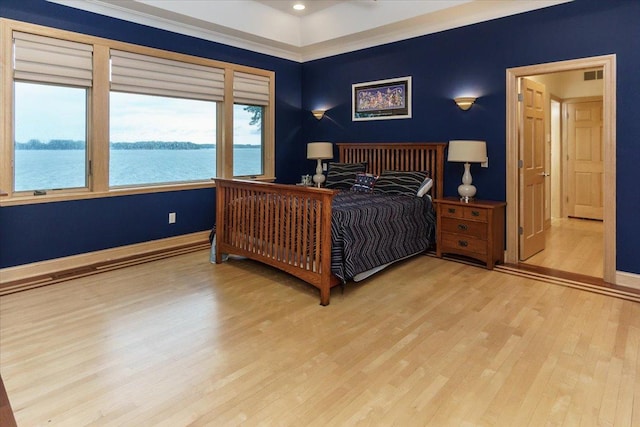 2719 Spring Lake Rd SW, Prior Lake, MN 55372 - bedroom featuring wood finished floors and a water view