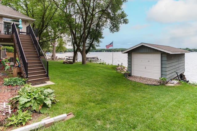 2719 Spring Lake Rd SW, Prior Lake, MN 55372 - view of green lawn featuring stairway, an outdoor structure, and a deck with water view