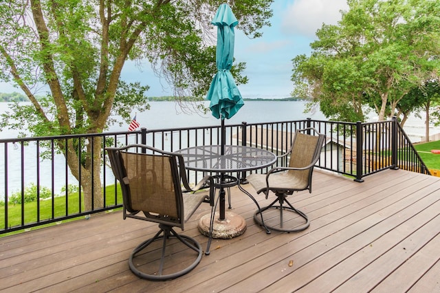 2719 Spring Lake Rd SW, Prior Lake, MN 55372 - deck with a water view and outdoor dining area