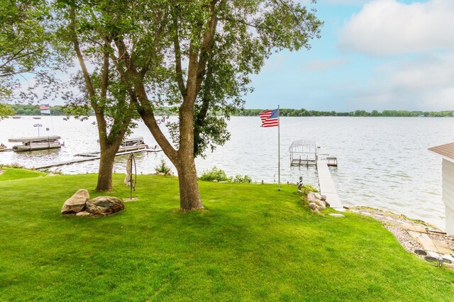 2719 Spring Lake Rd SW, Prior Lake, MN 55372 - view of grassy yard featuring a boat dock and a water view