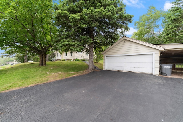 1921 Minneapolis Ave, Duluth, MN 55803 - view of front of house with a garage, a front lawn, and asphalt driveway