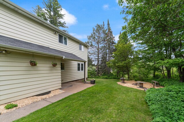 1921 Minneapolis Ave, Duluth, MN 55803 - view of grassy yard with a patio area