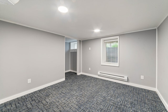 1921 Minneapolis Ave, Duluth, MN 55803 - spare room with a baseboard heating unit and dark carpet