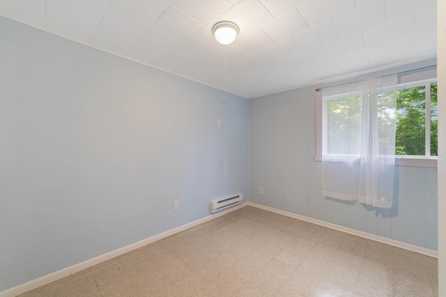 1921 Minneapolis Ave, Duluth, MN 55803 - empty room featuring a baseboard radiator and tile patterned floors