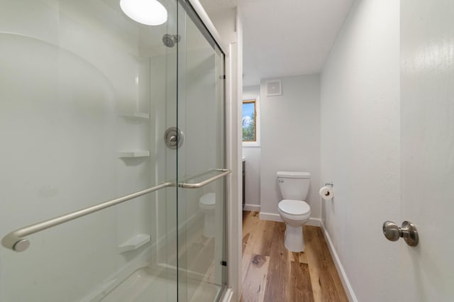 1921 Minneapolis Ave, Duluth, MN 55803 - bathroom with a shower stall and wood finished floors