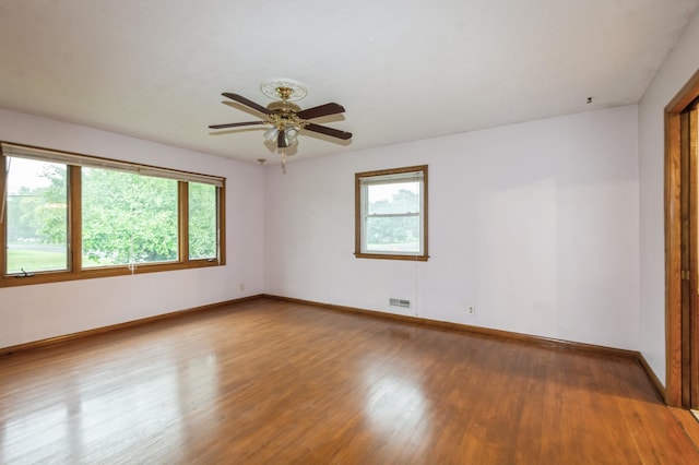 1501 100th St, Bloomington, MN 55431 - spare room with light wood-style floors and a ceiling fan