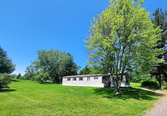 1329 US Highway 8, Balsam Lake, WI 54001 - manufactured / mobile home featuring a front yard and entry steps