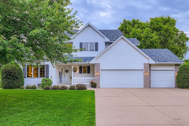 14078 Quince St NW, Andover, MN 55304 - traditional-style home featuring brick siding, driveway, covered porch, an attached garage, and a front yard