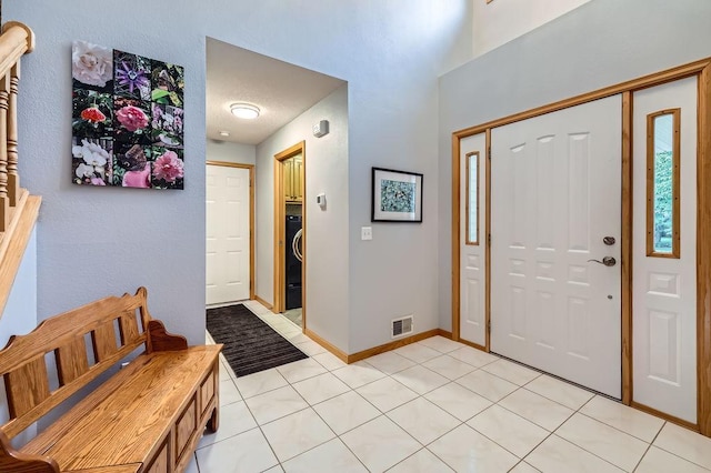 14078 Quince St NW, Andover, MN 55304 - foyer with light tile patterned flooring