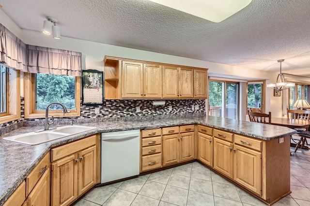 14078 Quince St NW, Andover, MN 55304 - kitchen featuring dishwasher, a peninsula, a textured ceiling, dark countertops, and a chandelier