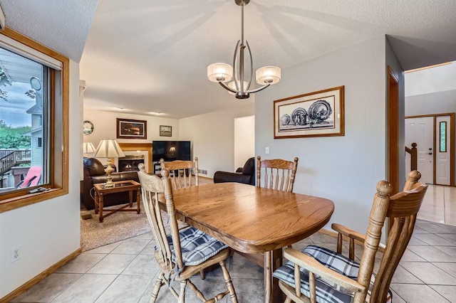 14078 Quince St NW, Andover, MN 55304 - dining space with light tile patterned floors and a chandelier