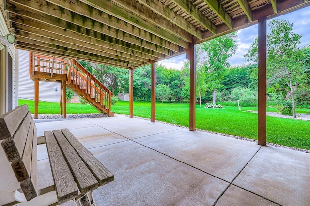 14078 Quince St NW, Andover, MN 55304 - view of patio featuring stairs and view of wooded area