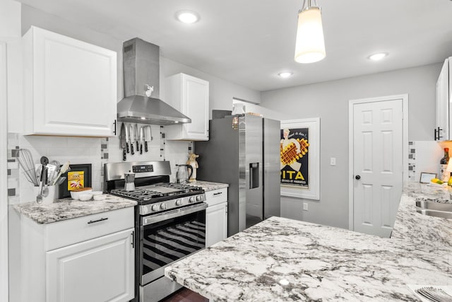 610 34th Ave N, Minneapolis, MN 55412 - kitchen with stainless steel appliances, wall chimney exhaust hood, backsplash, white cabinets, and light stone counters