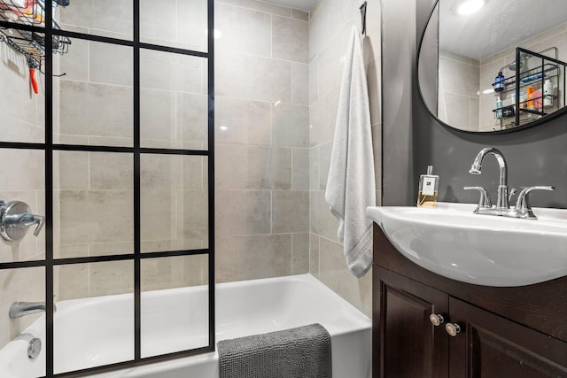 610 34th Ave N, Minneapolis, MN 55412 - bathroom featuring tub / shower combination and vanity
