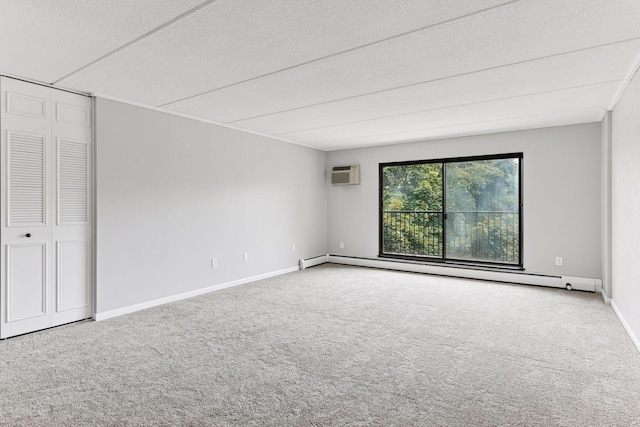 10501 Cedar Lake Rd Unit 515, Minnetonka, MN 55305 - carpeted empty room featuring a baseboard heating unit and a wall mounted air conditioner