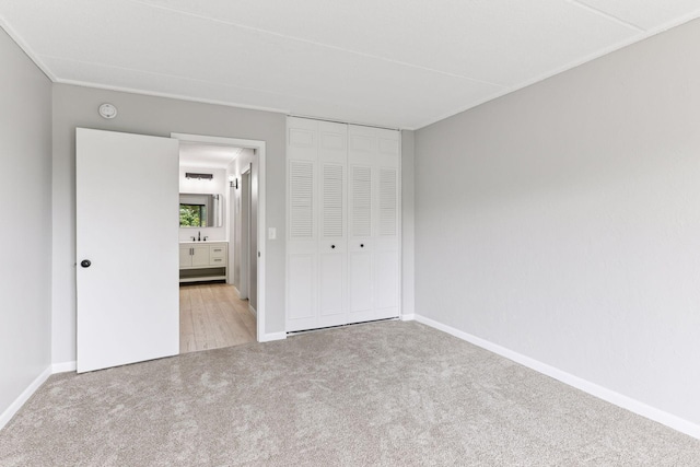 10501 Cedar Lake Rd Unit 515, Minnetonka, MN 55305 - unfurnished bedroom with carpet flooring and a closet