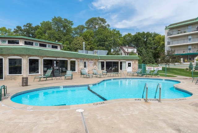 10501 Cedar Lake Rd Unit 515, Minnetonka, MN 55305 - community pool featuring a patio area