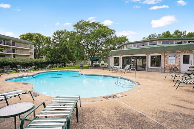 10501 Cedar Lake Rd Unit 515, Minnetonka, MN 55305 - community pool featuring a patio