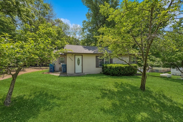 2900 Tuxedo Blvd, Mound, MN 55364 - view of front facade with a front lawn and roof with shingles