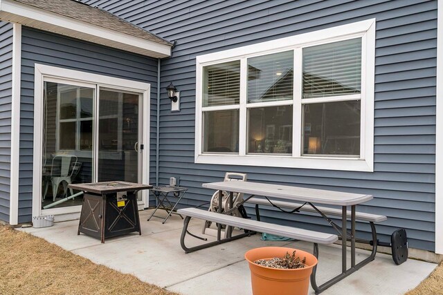 11242 131st Cir N, Dayton, MN 55327 - view of patio with an outdoor fire pit