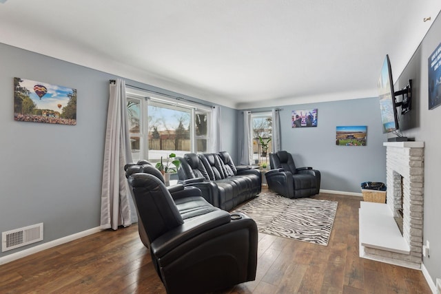 7632 Dupont Ave S, Richfield, MN 55423 - living room featuring a brick fireplace and wood-type flooring