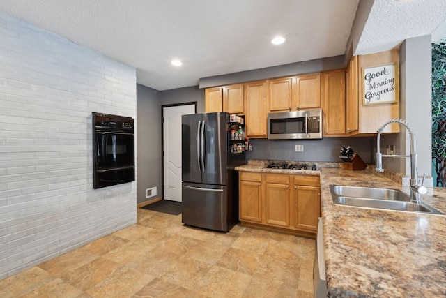 7632 Dupont Ave S, Richfield, MN 55423 - kitchen featuring stainless steel appliances, a warming drawer, light countertops, a textured ceiling, and recessed lighting