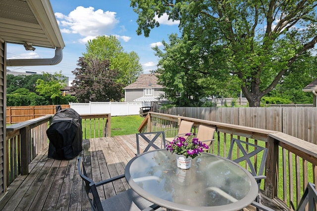 7632 Dupont Ave S, Richfield, MN 55423 - wooden terrace with a fenced backyard, outdoor dining area, and grilling area