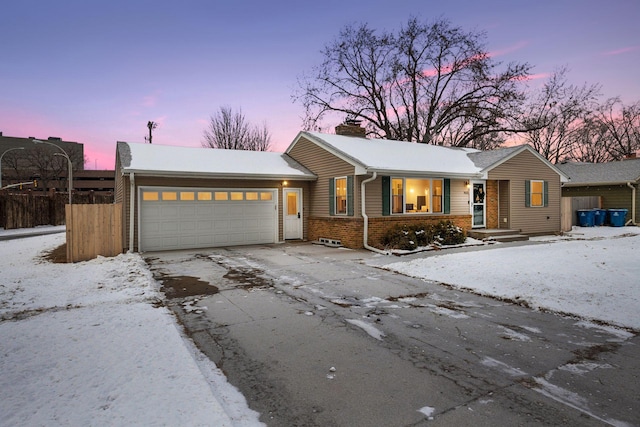 7632 Dupont Ave S, Richfield, MN 55423 - ranch-style home featuring a chimney, an attached garage, brick siding, and driveway