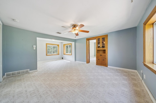 N3752 County Road K, Trenton Twp, WI 54014 - carpeted spare room featuring a ceiling fan and a smoke detector