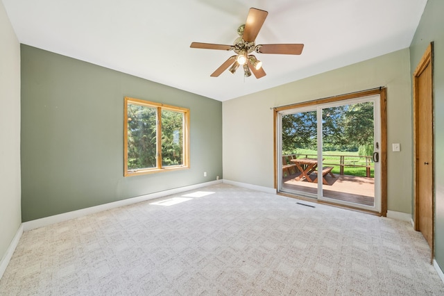 N3752 County Road K, Trenton Twp, WI 54014 - carpeted empty room featuring baseboards and ceiling fan