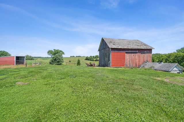 N3752 County Road K, Trenton Twp, WI 54014 - view of grassy yard featuring an outbuilding