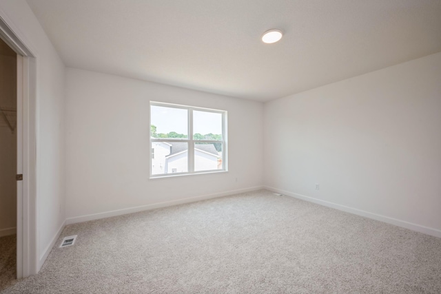 11730 71st St NE, Otsego, MN 55301 - unfurnished bedroom featuring light colored carpet and baseboards