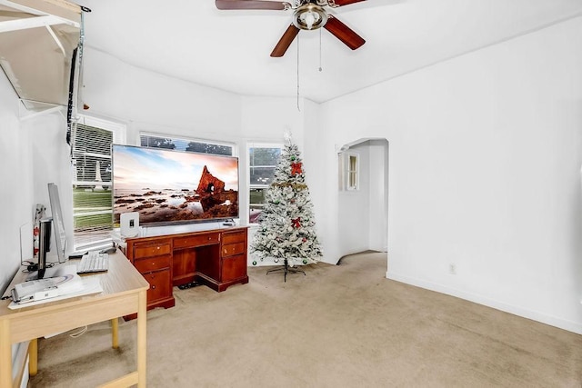35 Front Ave, Saint Paul, MN 55117 - home office with arched walkways, a ceiling fan, light carpet, and healthy amount of natural light