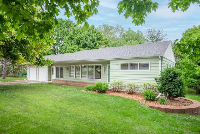 1030 Idaho Ave N, Golden Valley, MN 55427 - single story home with a garage, a front lawn, driveway, a chimney, and roof with shingles