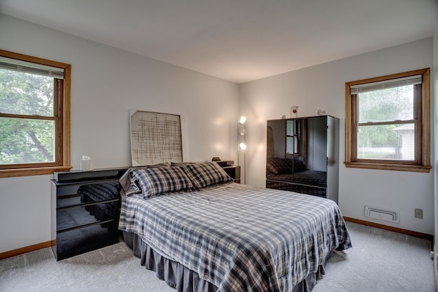 1030 Idaho Ave N, Golden Valley, MN 55427 - bedroom featuring light carpet and baseboards