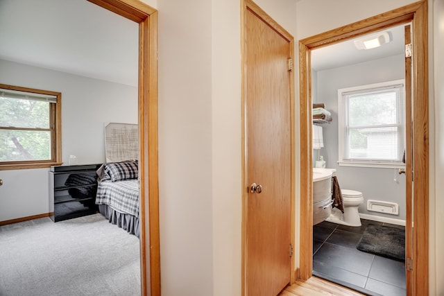 1030 Idaho Ave N, Golden Valley, MN 55427 - hallway featuring healthy amount of natural light