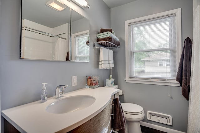 1030 Idaho Ave N, Golden Valley, MN 55427 - bathroom featuring healthy amount of natural light, vanity, and a shower with curtain