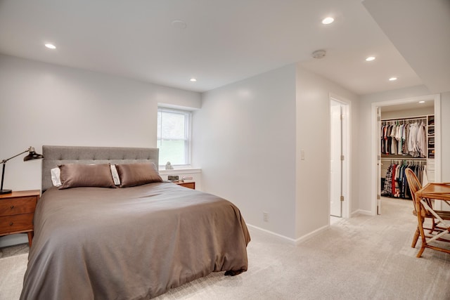1030 Idaho Ave N, Golden Valley, MN 55427 - bedroom with recessed lighting, light carpet, and a walk in closet